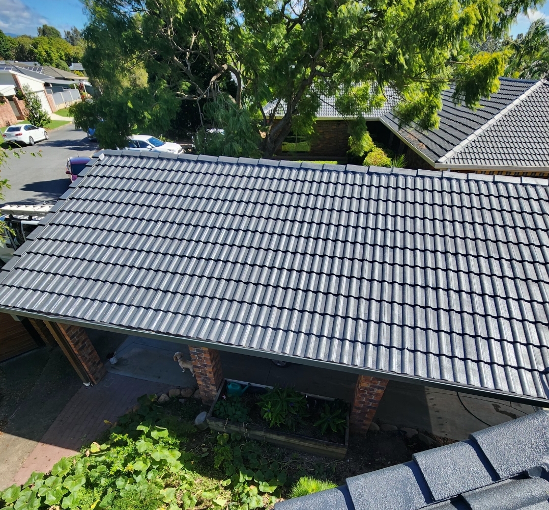 Tiled roof repainted in charcoal, seen from above