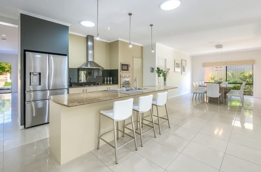 Open plan kitchen and living area with fresh interior paint